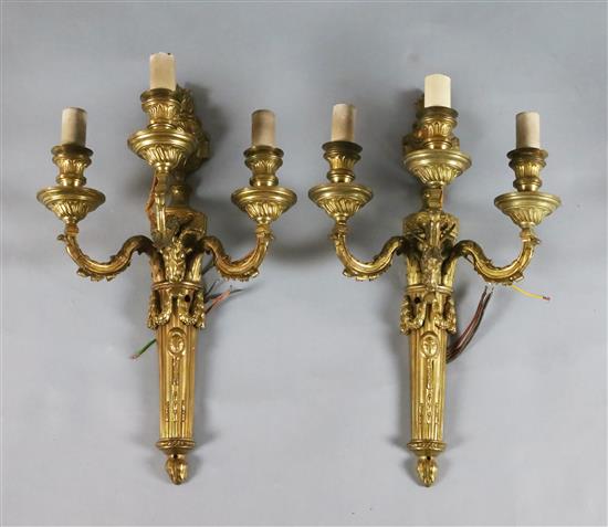 A pair of Adam revival ormolu three branch wall lights, width 12.5in. height 21.5in.